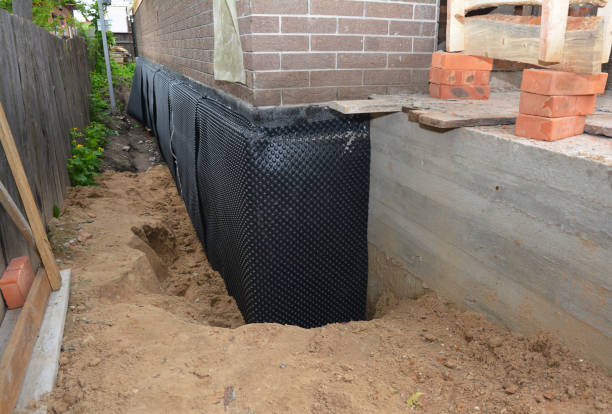 SJ Waterproofing Pros technician performing targeted Sump Pump Installation assessment in Lakeview, OH